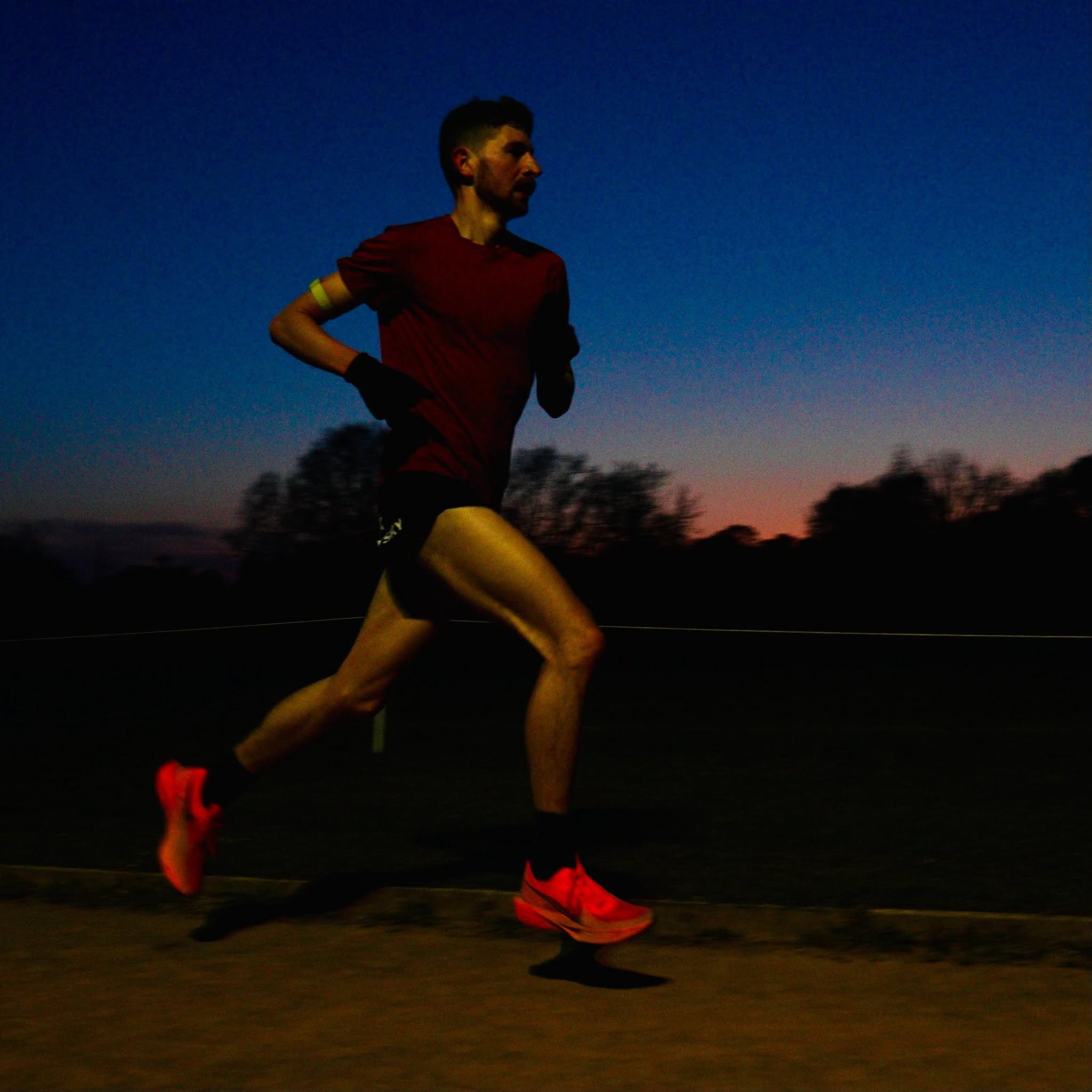 Keiren running strongly at dusk